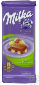 Шоколад молочный Милка с цельным лесным орехом и с добавлением альпийского молока 95г плиточный Украина